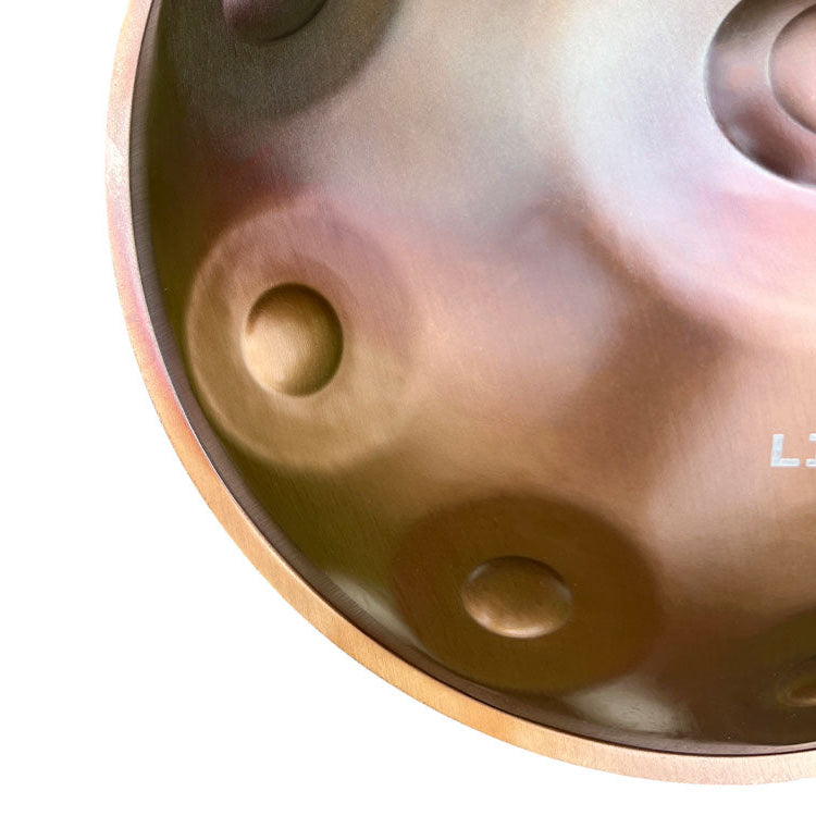 Close-up van Ember Steel Handpan textuur en toonvelden